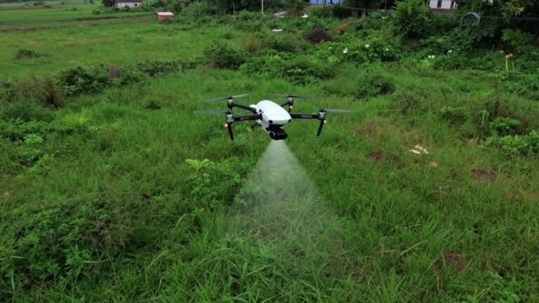 Drone with LiDAR scanning a green landscape.
